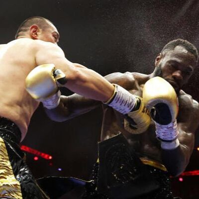 Zhilei Zhang Bangs Deontay Wilder Into Retirement